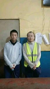 Two Chinese nationals arrested for assaulting employee