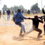 Activist Assaulted in Broad Daylight as Security Forces Stand By