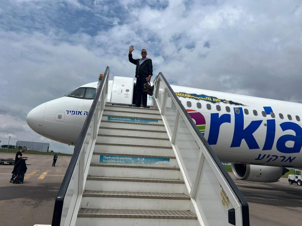Malawi’s Honorary Consul to Israel, Nir Gess, waving at Kamuzu International airport boarding airplane on his way to Israel