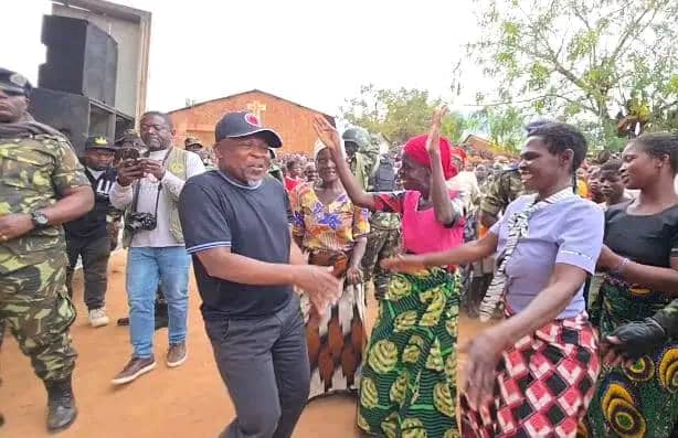 Malawi vice president Dr Michael Usi interacting with women on his whistle-stop rally at Limbuli in Mulanje