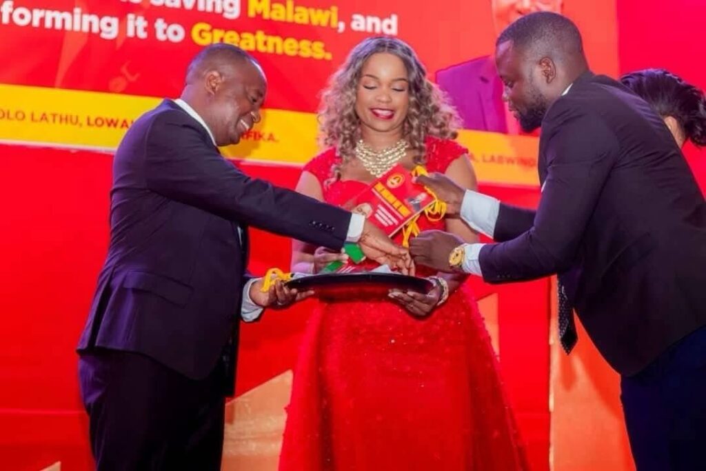 UTM Presidential candidate Dr Dalitso Kabambe presenting copy of UTM manifesto during manifesto launch at Golden Peacock hotel in Lilongwe the capital city of Malawi