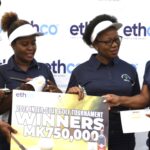 chakaniza (right) presenting a cheque to nchalo team the winners of inter club tournament last year