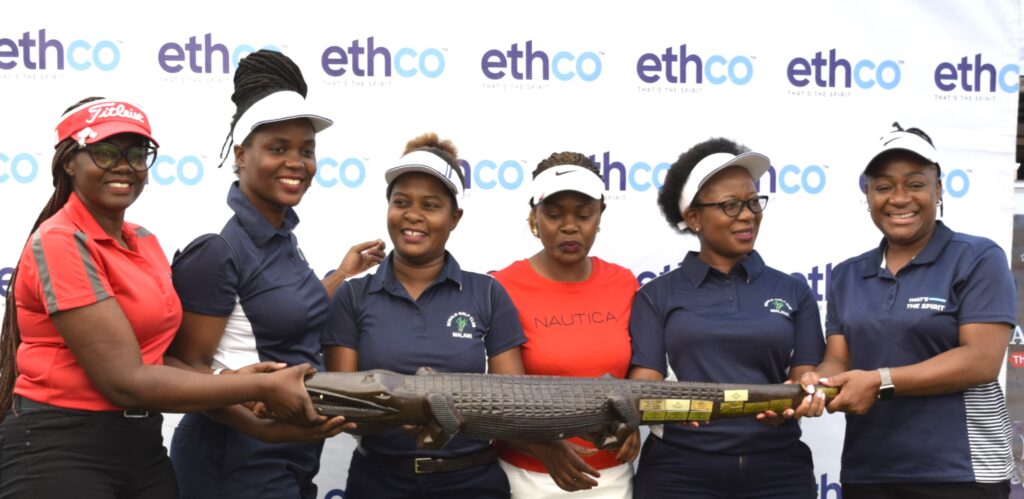 EthCo boosts ladies golf with K18 million sponsorship flashback; chakaniza (right) presents the big crocodile trophy to nchalo team during last year