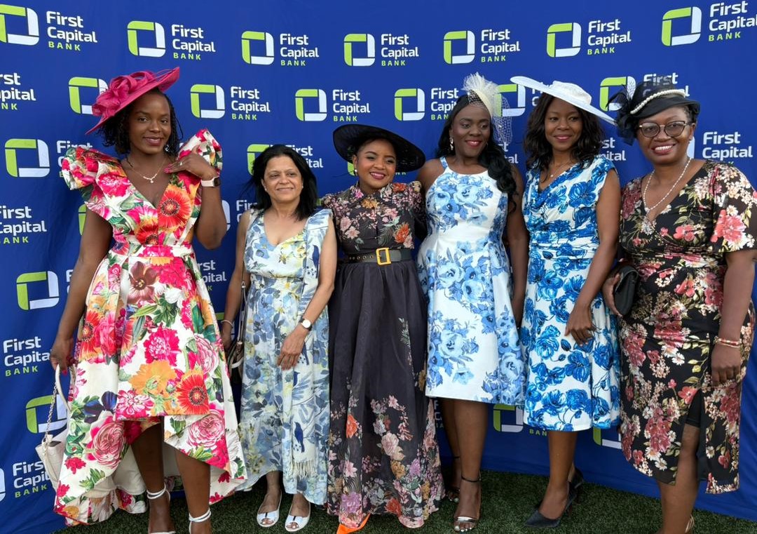 mwathengere (second right) posing for a picture with other guests at the high tea party (002)