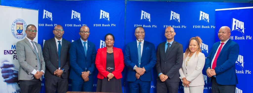 mubas and fdh bank officials pose for a photograph after the event