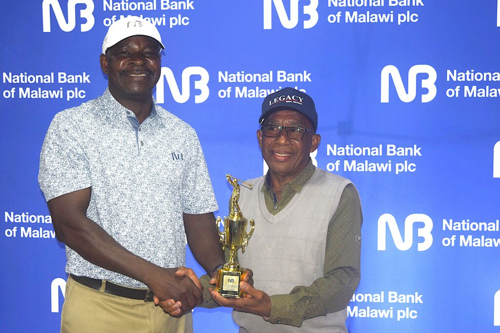 mabulekesi (left) handing over the award to sharriff (002)