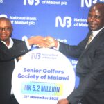 mabulekesi (right) handing over the dummy cheque to chinkanda (002)