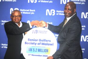 NBM plc commits K11.2 million to Senior Golfers Tourney, AGM mabulekesi (right) handing over the dummy cheque to chinkanda (002)
