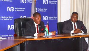 NBM Plc commits K300 million towards national food relief 6 mwanamveka (left) speaking to the media (002)