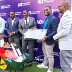 patsanja (second right) and mzuzu service manager samson mzungu handing over sanitation equipments to moses (middle) as other mcc officials look on (002)