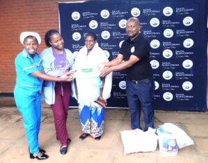 SKC Foundation supports Bwaila Hospital with K6 million items valera (right) handing over some of the items to zoto (far left) flanked by other beneficiaries (002)