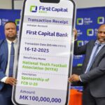 chirwa (left) handing over the cheque to chavura (002)