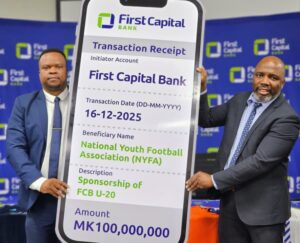 chirwa (left) handing over the cheque to chavura (002)
