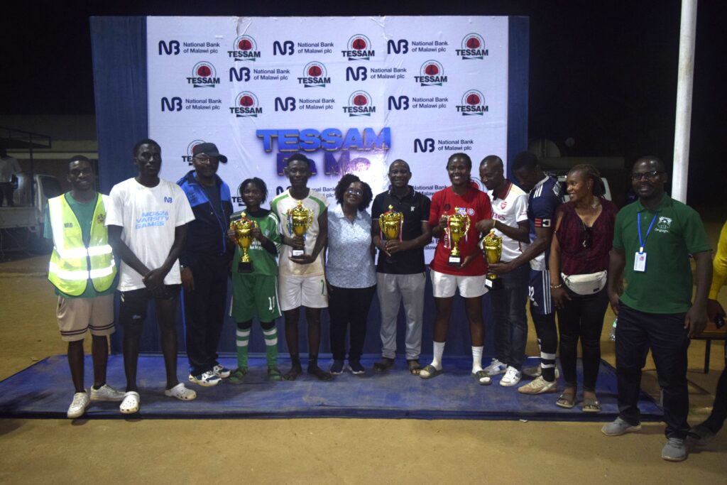 mzuni pose with their five trophies (002) (1)