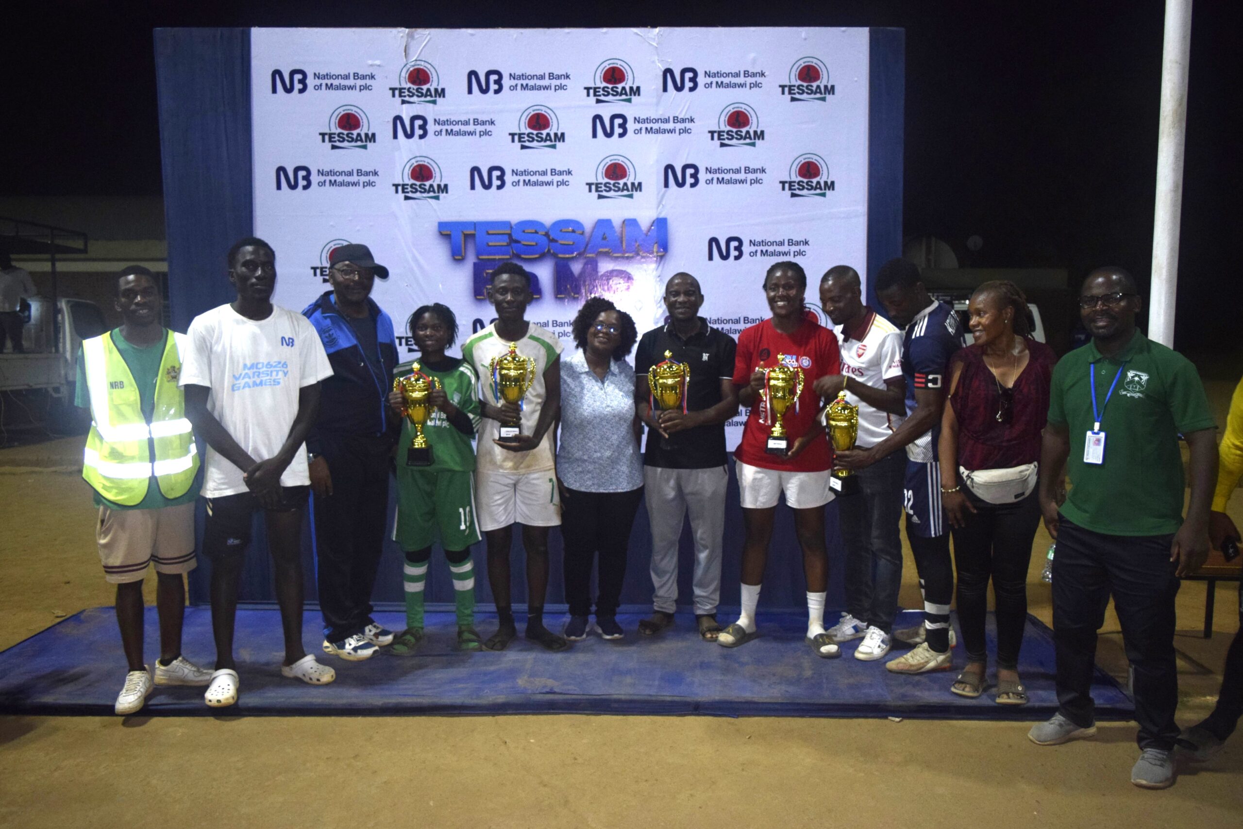 mzuni pose with their five trophies (002) (1)