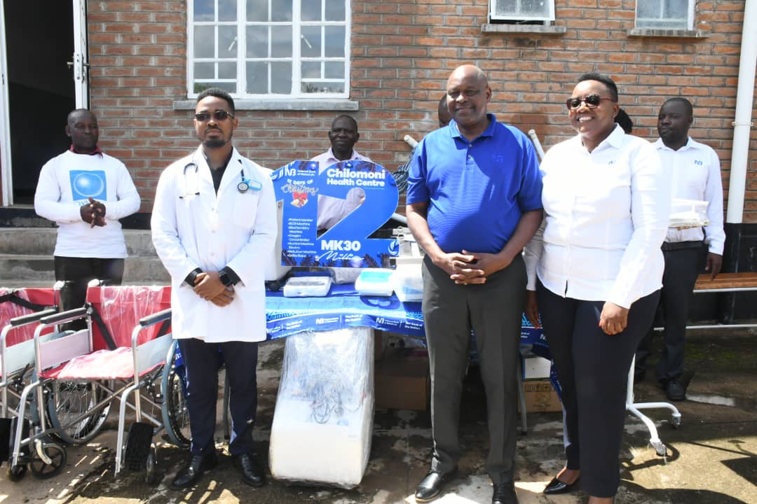 nbm plc handing over medical equipment to chilomoni health center (2) (002)