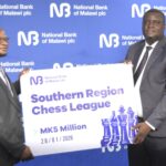 NBM plc boosts Veterans chess tourney with K5 million support ngalande (right) handing over symbolic cheque to nyamilandu (002)