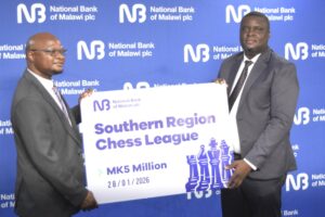 ngalande (right) handing over symbolic cheque to nyamilandu (002)