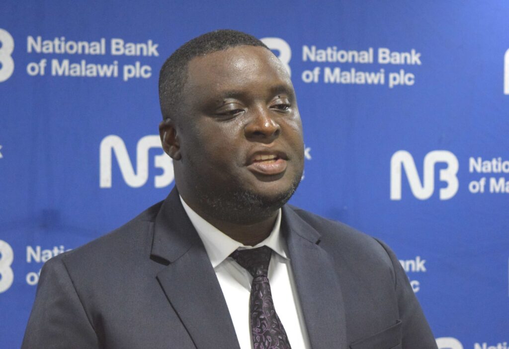 NBM plc boosts Veterans chess tourney with K5 million support ngalande says the donation is directed towards the devepment of chess (002)