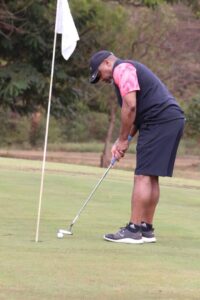 Standard Bank tees off SKC memorial golf with K20 million donation Chilima on the golf course (1)