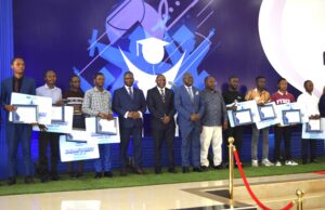 Dignitaries and dean's list awardees pose for a group photo during the launch (002)