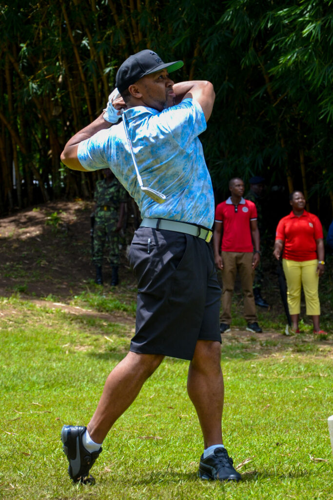 swing; the late chilima tees off