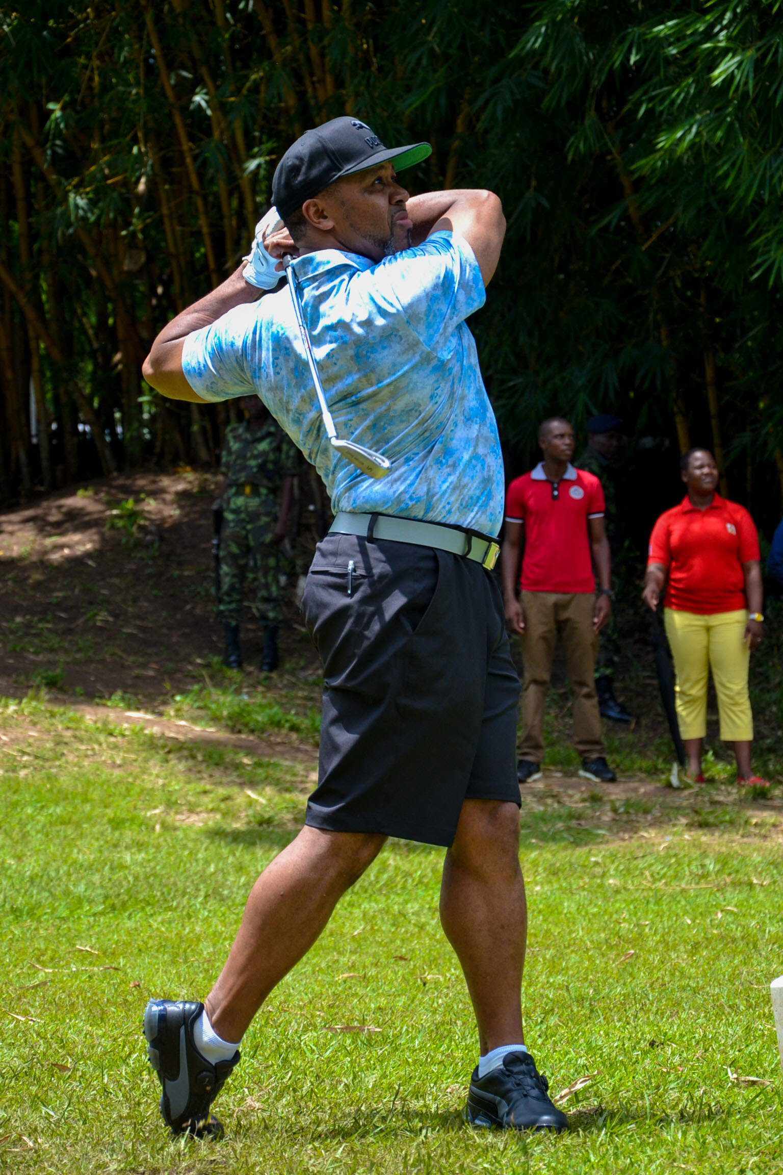swing; the late chilima tees off