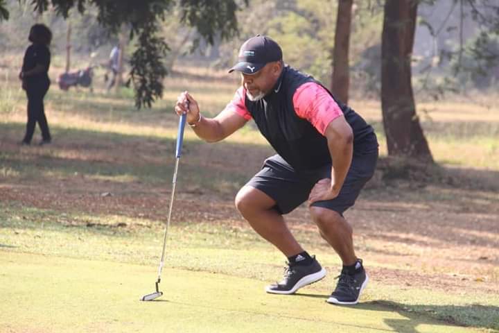 the late chilima during a game of golf