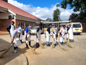 Gazette Media donates K300,000 to WASH Initiative Gazette Media WASH Media Forum in a clean up exercise at QECH (002)