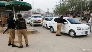 Pak Reduces Petrol Prices, Announces Free Public Transport Amid Energy Crisis Police officers managing traffic situation