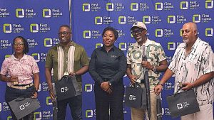 Agness Jazza (Centre) CEO of FCB posing for a photo with the winners (002)