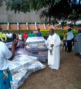 Nathenje Parish Fundraising and Development Committee Hands Over Mattresses to Girls