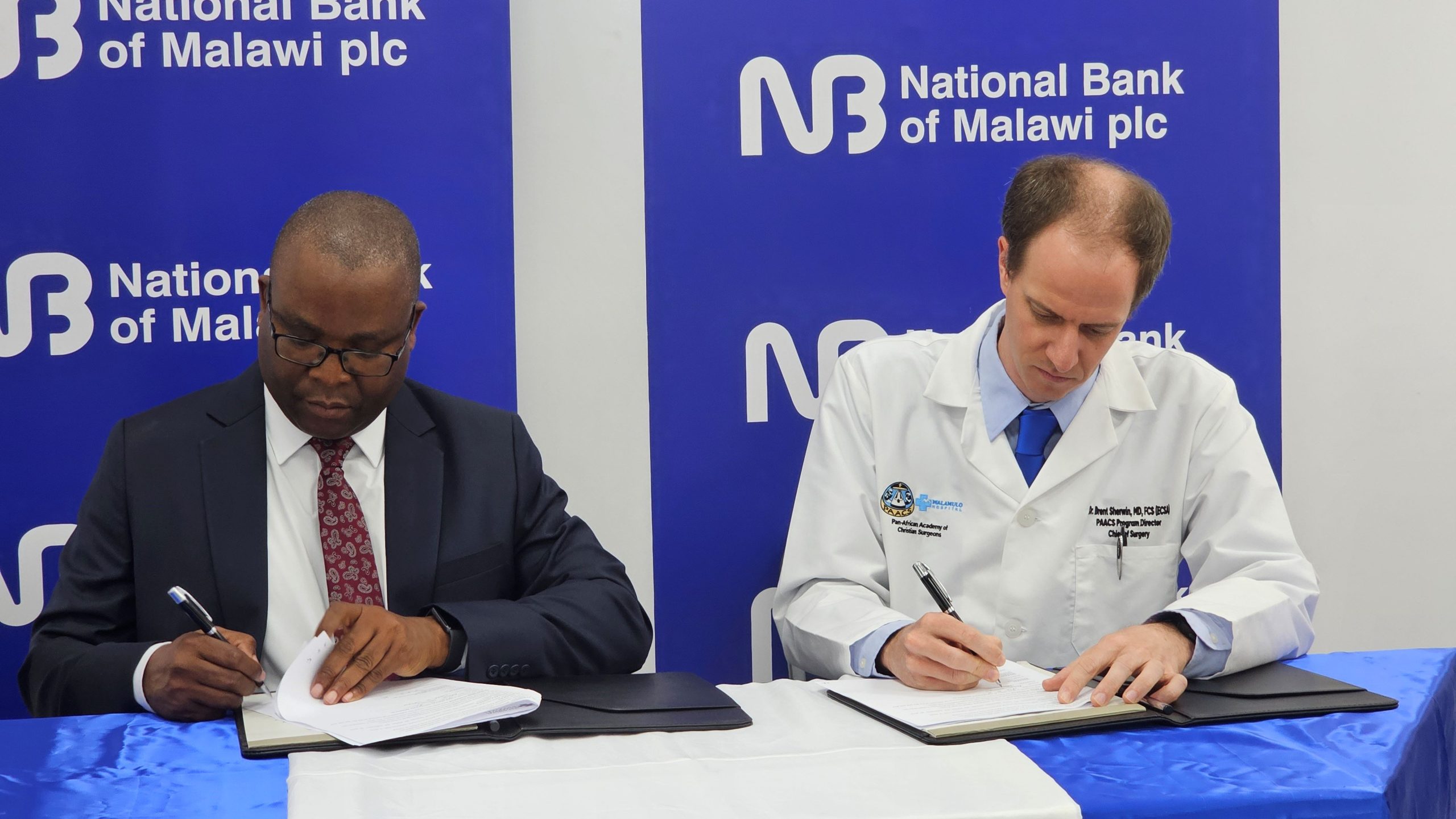 Katsala Left signing the MoU with Sherwin 002 scaled