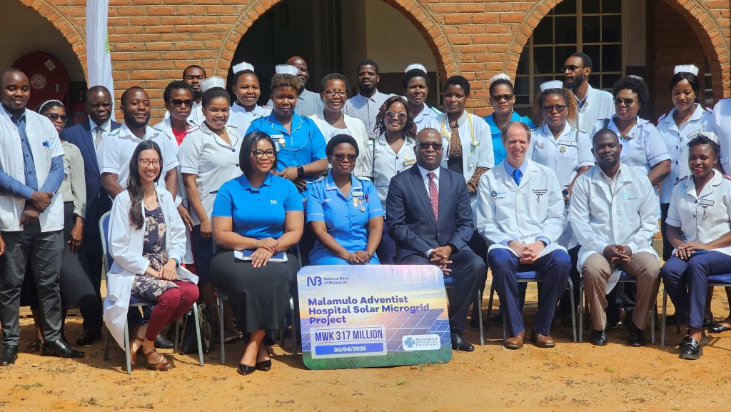 Malamulo hospital staff poses for a picture with National Bank plc staff after at the MoU signing event 002