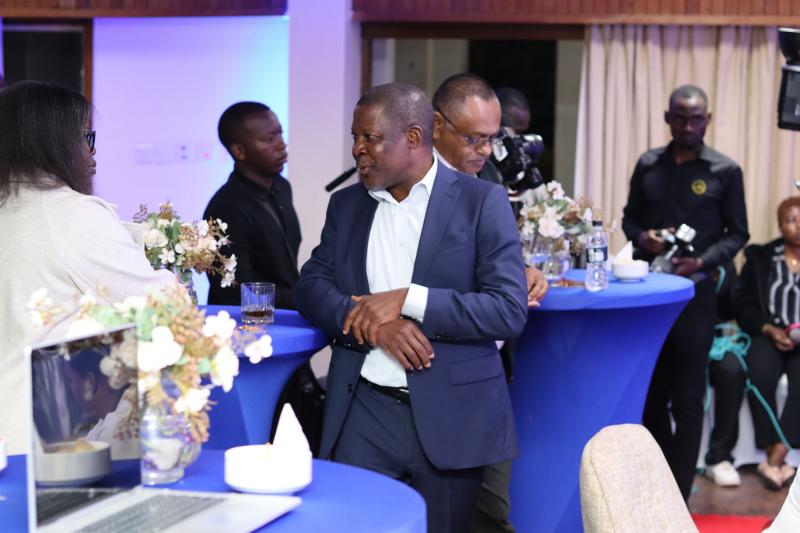 NBM executives and customers networking at a customer engagement cocktail in Mzuzu