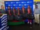 Chimwemwe Chijere NBM plc Business Development Manager Right posing for a picture with the Womens Team squad at KIA alongside an official from the team 002