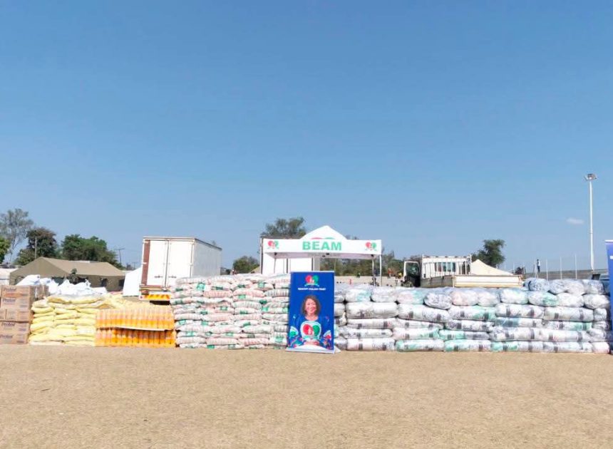 Mutharika, First Lady Support 1,000 Repatriated Malawians with Relief Items