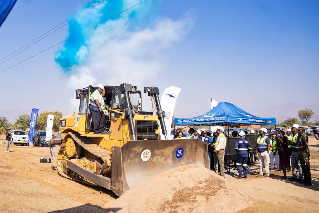 Kabango on the catepillar to mark the launch of the work project 002