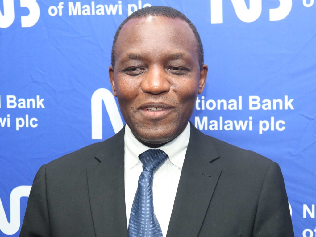 NBM plc unveils 2 ‘Waku WAFCON’ grand prize winners 1 NBM plc Head of Digital Finance Services William Kaunda