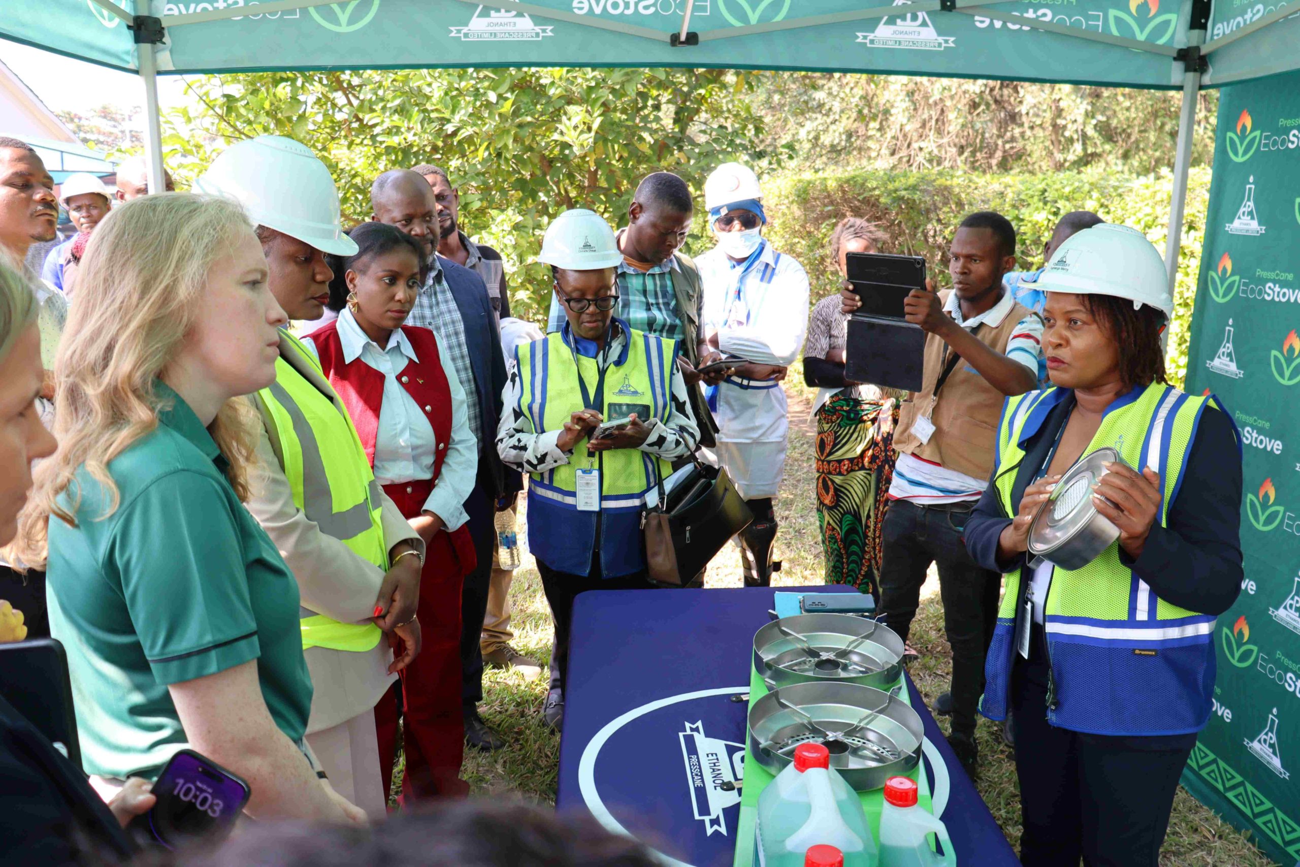 Press Cane Sales and Marketing Manager Mercy Kamanga right explaining how the EcoStove works scaled