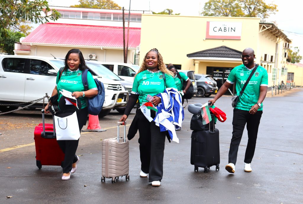 Products Promotions and Advertising Executive for NBM plc Eneless Mlongoti Left Mangani Centre and MsatiyendaRight departing for Morroco at KIA 002