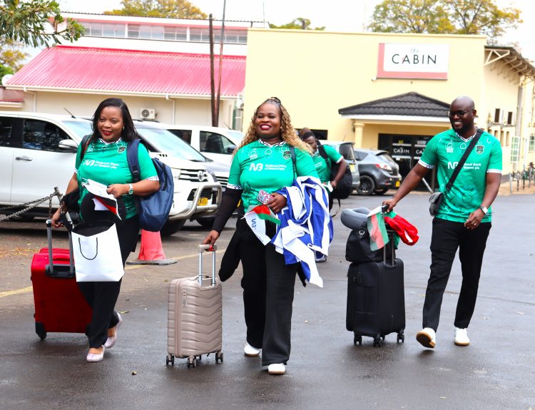 Products Promotions and Advertising Executive for NBM plc Eneless Mlongoti Left Mangani Centre and MsatiyendaRight departing for Morroco at KIA 002