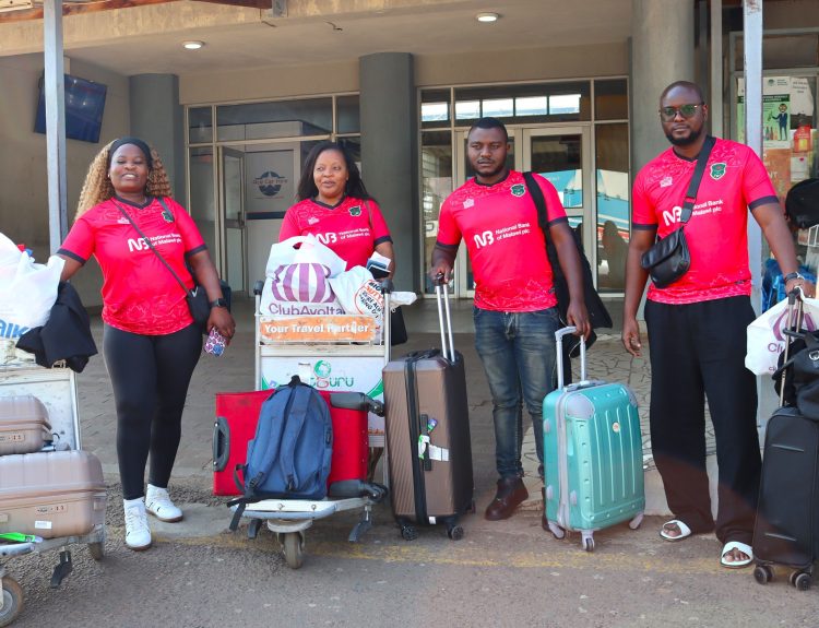 The grand winners captured with Bank officials on arrival at Bakili Muluzi Airport 002