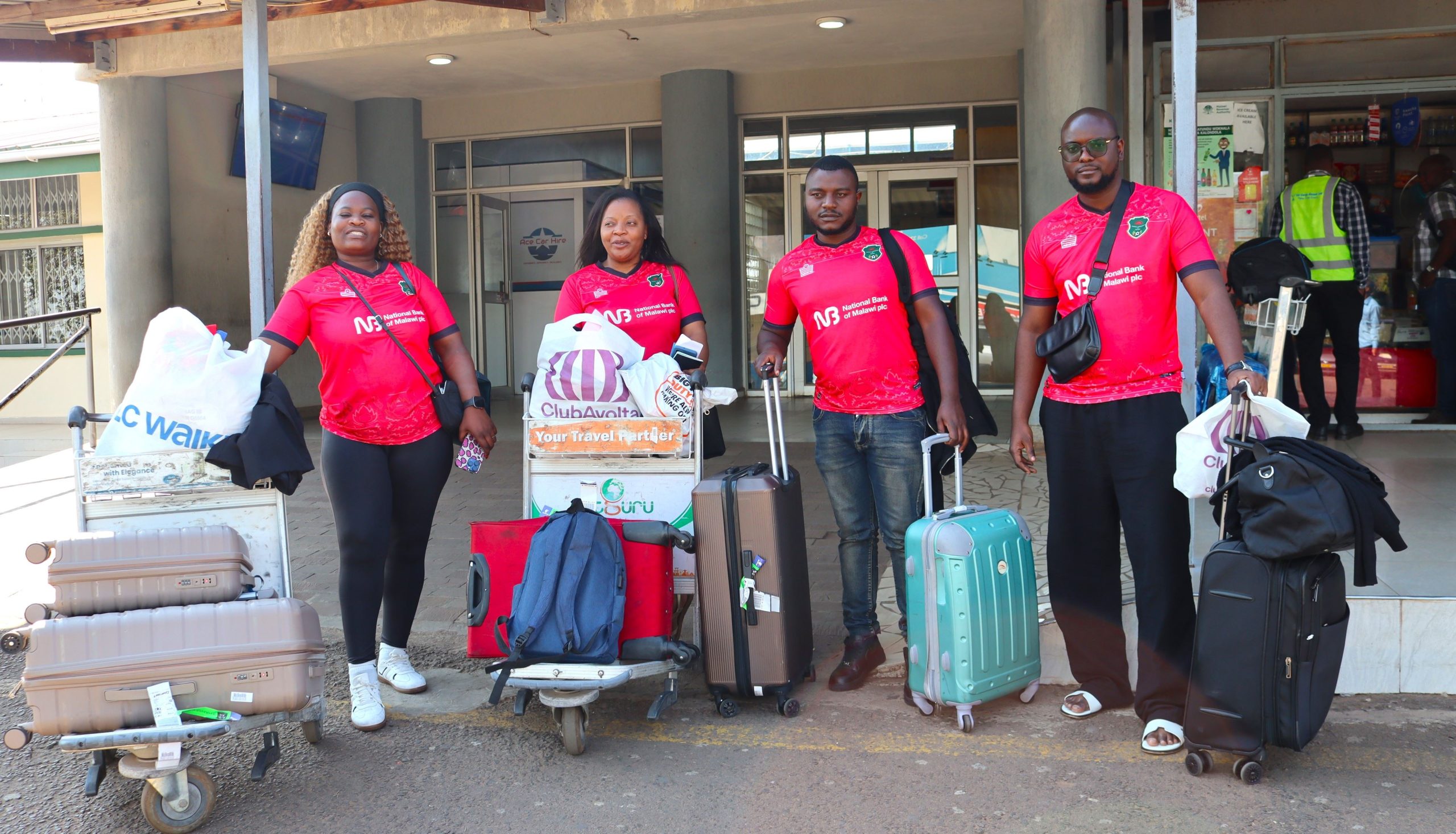 NBM ‘Waku WAFCON’ winners cherish Morocco experience 1 The grand winners captured with Bank officials on arrival at Bakili Muluzi Airport 002 scaled