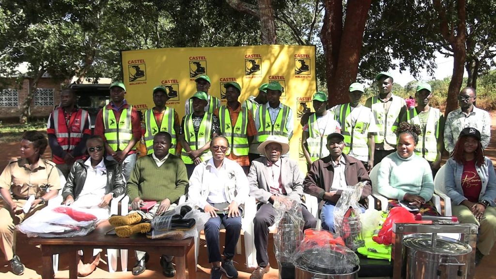 Castel Malawi donates Beekeeping equipment to Lunyangwa Communities in Mzuzu 18 Zimba seated middle poses with the community leaders and the donated equipment