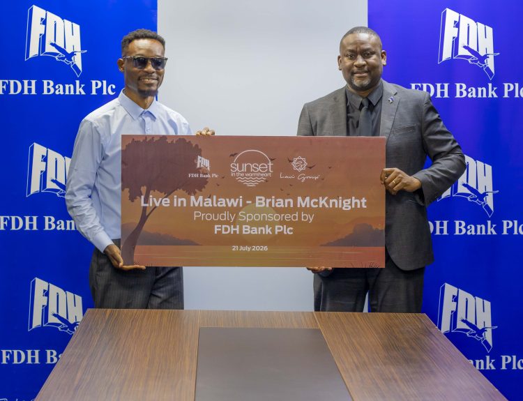 FDH Bank plc backs Brian McKnight concert 1 kaimilaRight handing over the dummy cheque to Lawi 002