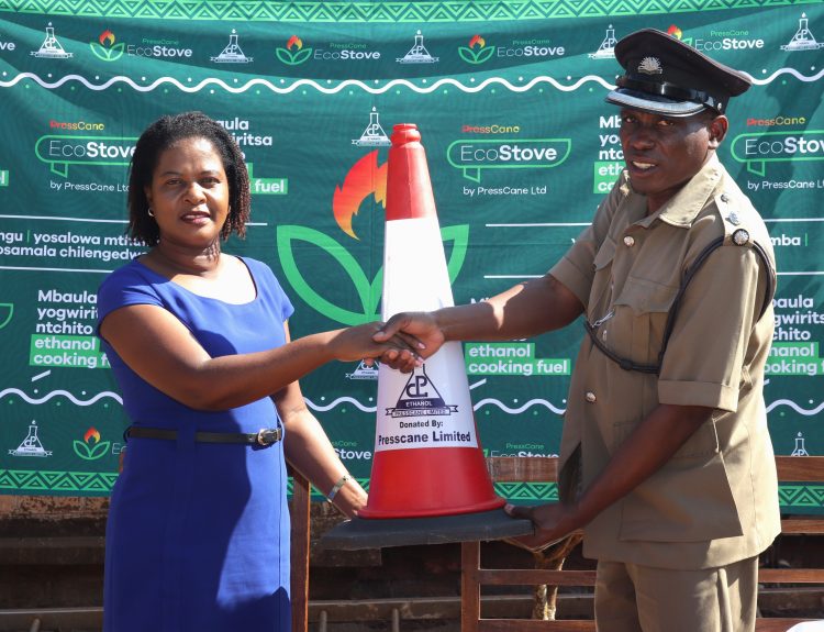 Kamangaleft shaking hands with Matinga during handover 002