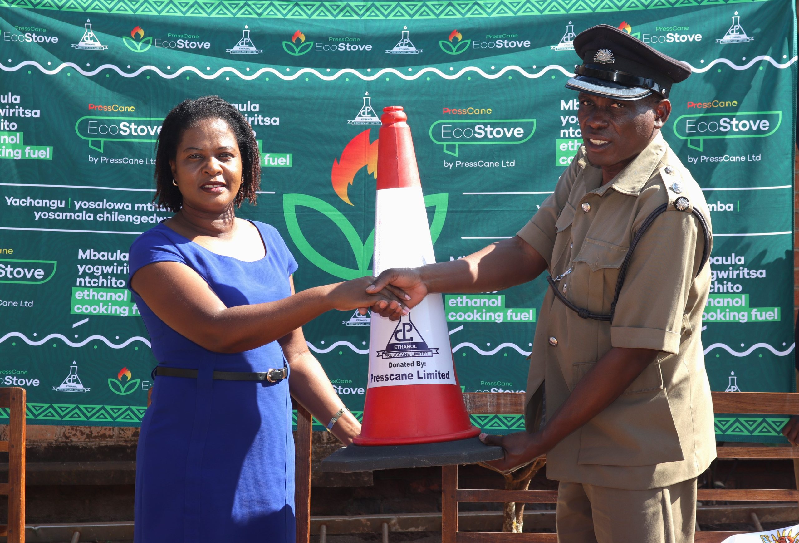 Kamangaleft shaking hands with Matinga during handover 002 scaled