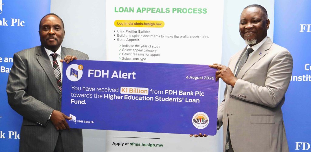 FDH plc signs 5-year K1 billion sponsorship deal with HESLGB 3 Mkulichi right hands over a dummy cheque to Mphepo 002