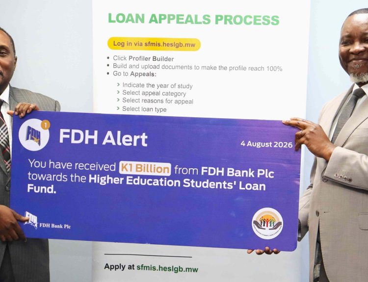 Mkulichi right hands over a dummy cheque to Mphepo 002